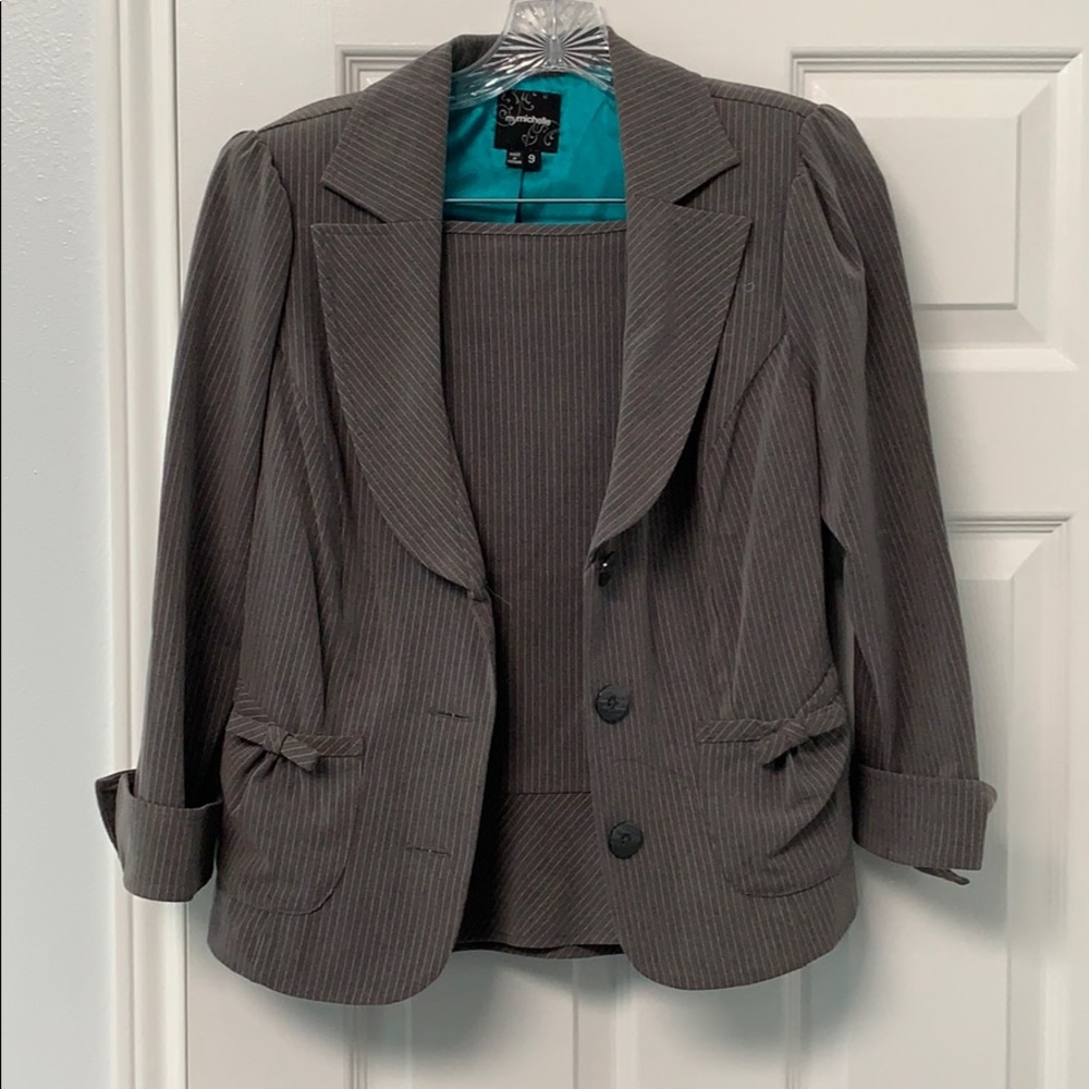 Grey two piece skirt suit